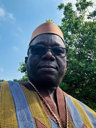  Mr. Alpha Lalugbah